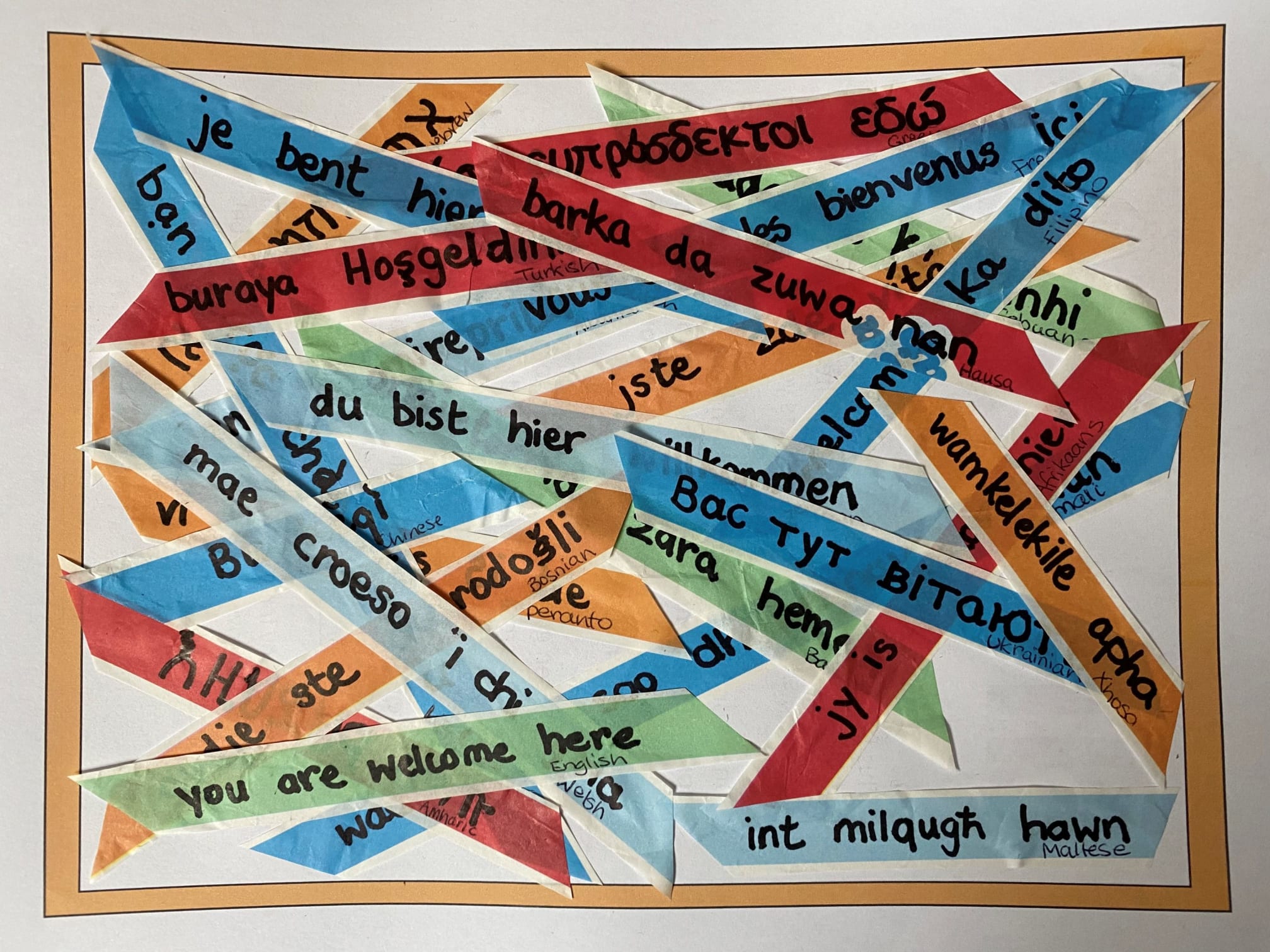 A collage, made by a client, featuring welcome messages in various langauges